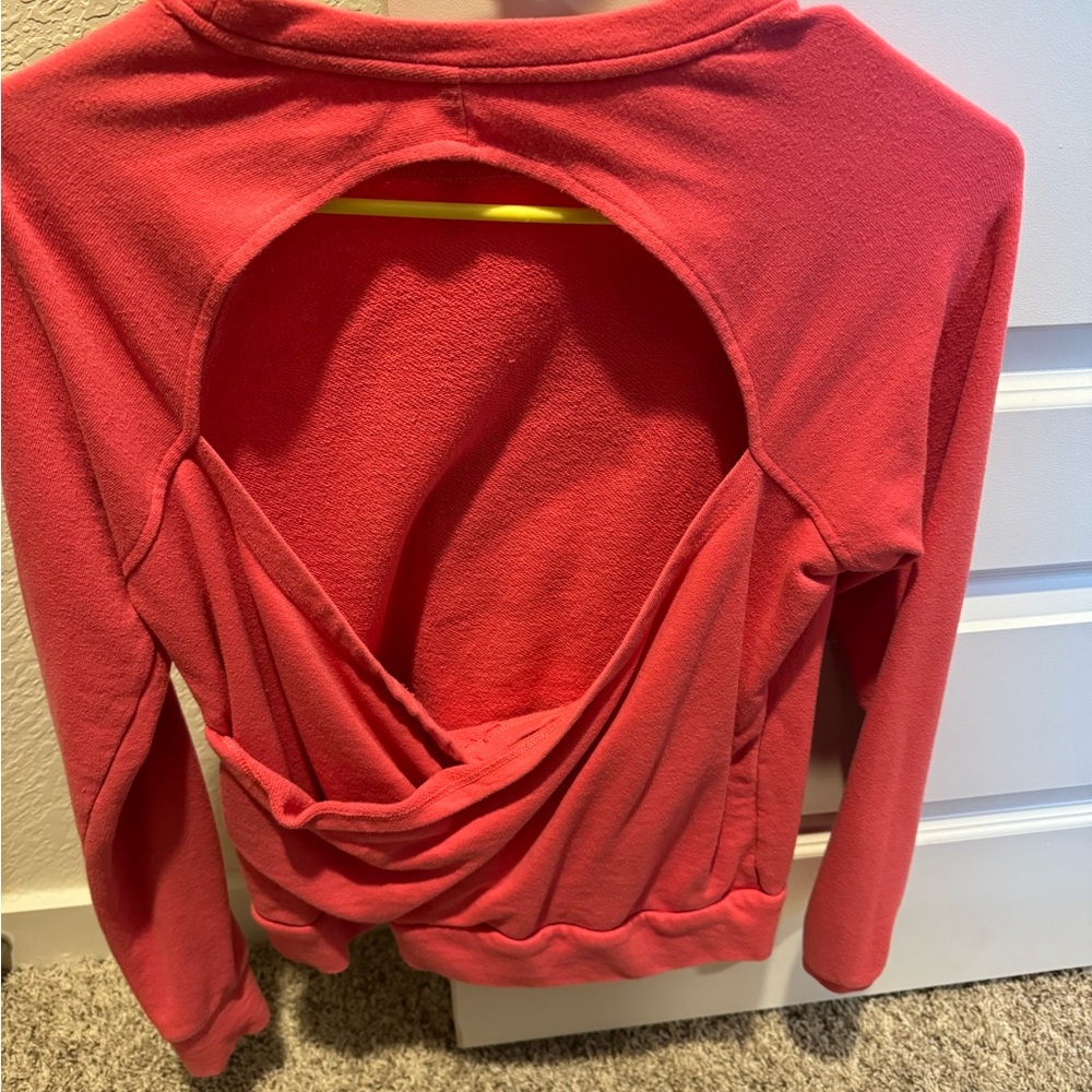 Fabletics open back sweatshirt. Worn minimally. Open thumb holes on both sleeves